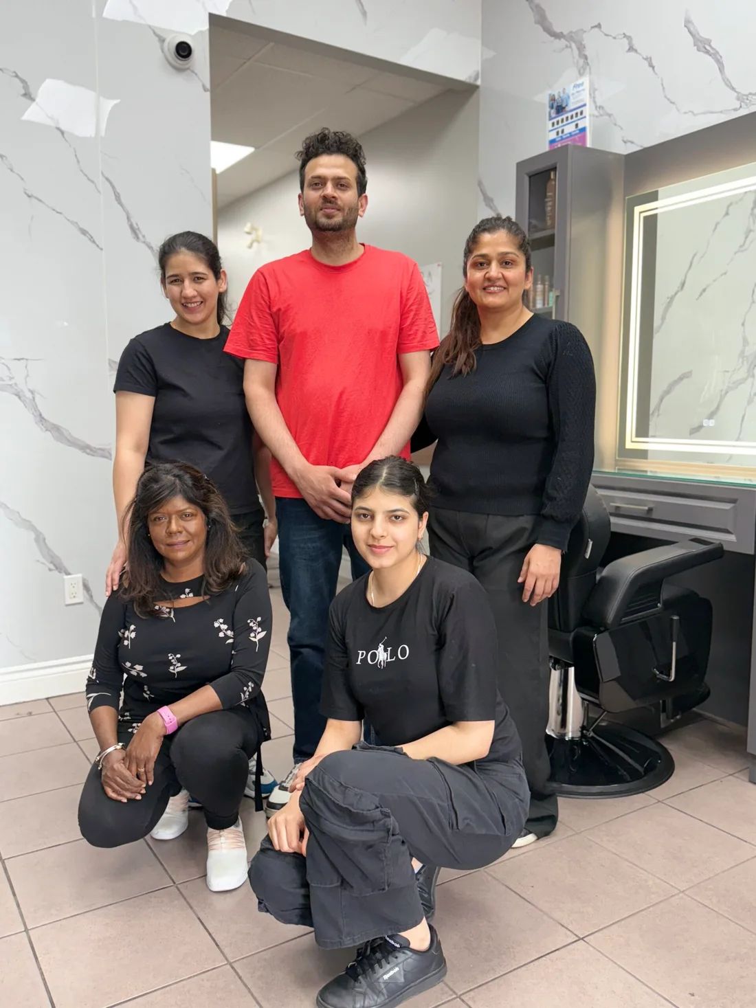 The 7 Heaven team together in the salon