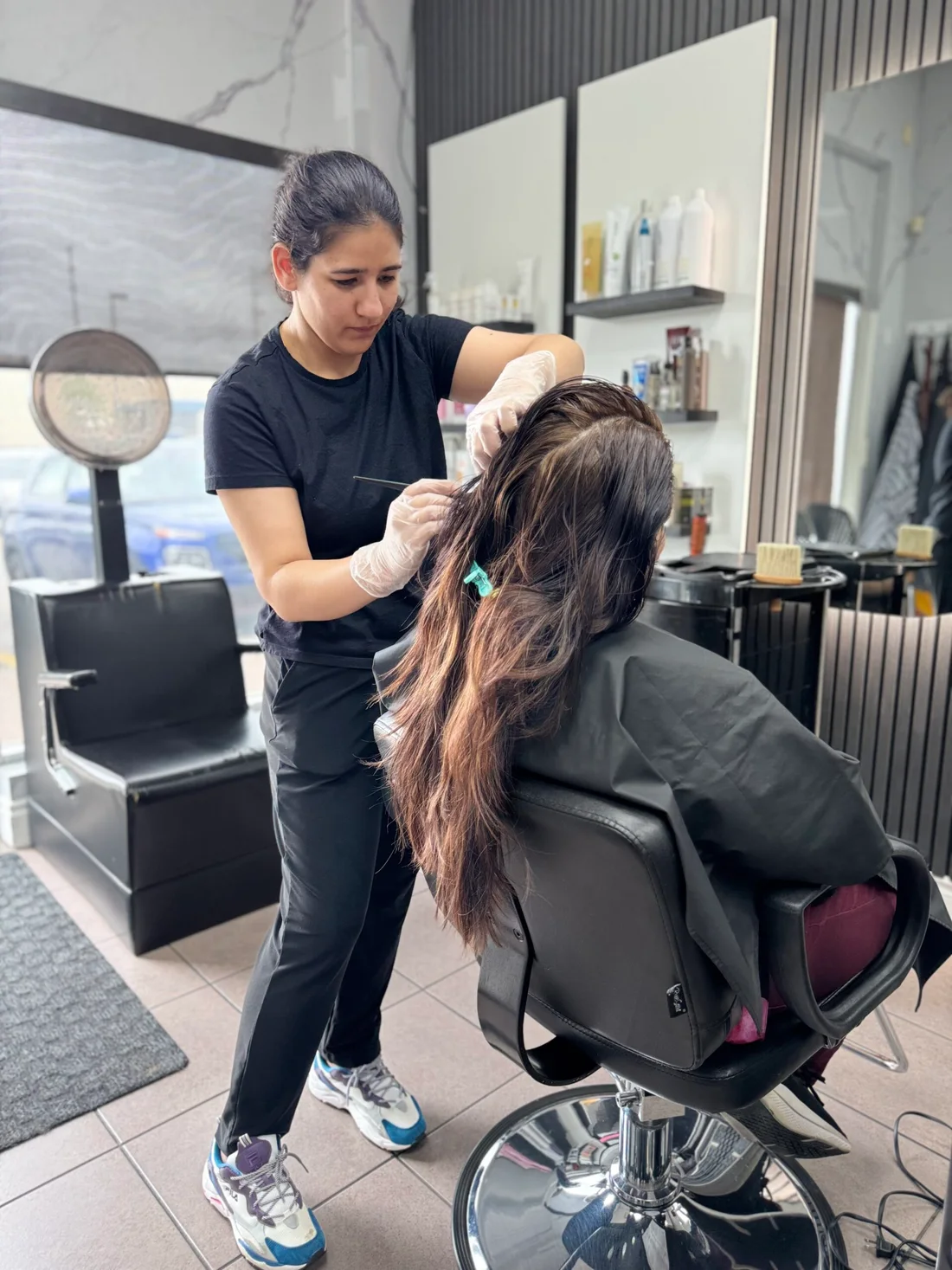 Meenal working with a client at 7 Heaven
